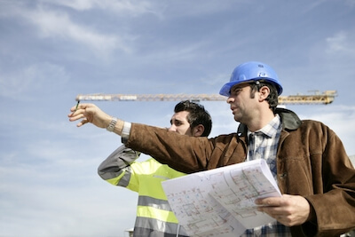 men directing on building site